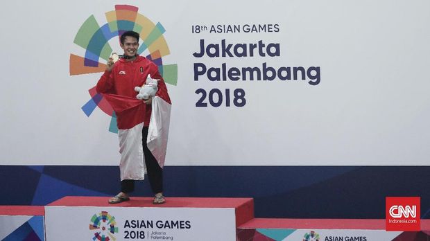 Komang Harik Adi Putra meraih medali emas pencak silat di Asian Games 2018.