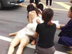 Masih Pakai Gaun Pengantin, Aksi Wanita Tolong Korban Kecelakaan Ini Viral