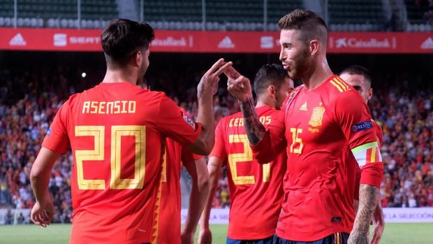 Marco Asensio dan Sergio Ramos sama-sama menyumbang gol untuk timnas Spanyol.