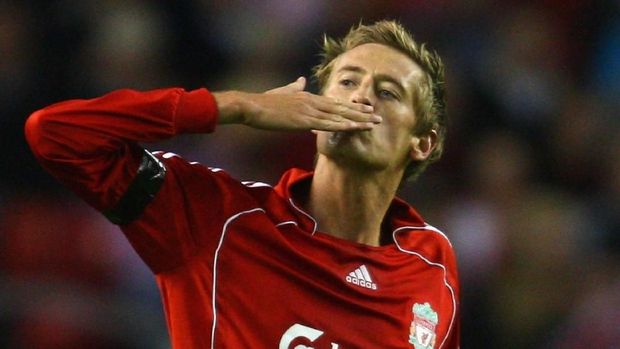 LIVERPOOL, UNITED KINGDOM - AUGUST 28:  Peter Crouch of Liverpool blows a kiss to the crowd after scoring the opening goal during the UEFA Champions League Qualifier third round, second leg match between Liverpool and Toulouse at Anfield on August 28, 2007 in Liverpool, England. (Photo by Shaun Botterill/Getty Images)