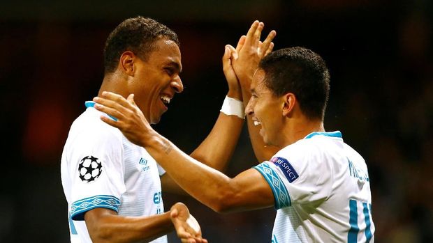 PSV Eindhoven akan berusaha mencuri kemenangan di markas Barcelona.