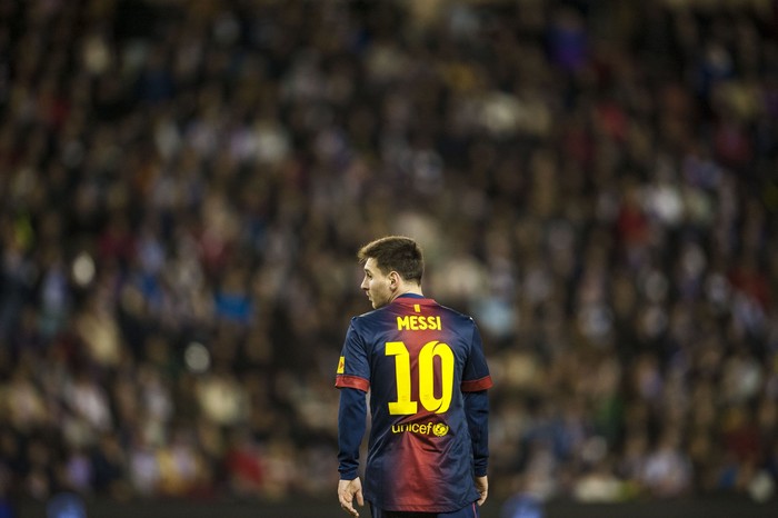 Lionel Messi VALLADOLID, SPAIN - DECEMBER 22:  Lionel Messi of FC Barcelona looks on during the La Liga game between Real Valladolid and FC Barcelona at Jose Zorrilla on December 22, 2012 in Valladolid, Spain.  (Photo by Victor Fraile/Getty Images)