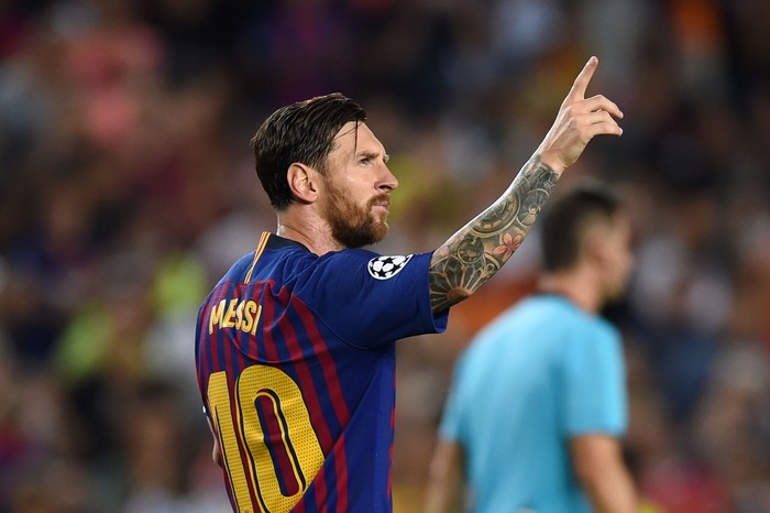 BARCELONA, SPAIN - SEPTEMBER 18:  Lionel Messi of Barcelona celebrates after scoring his teams third goal during the Group B match of the UEFA Champions League between FC Barcelona and PSV at Camp Nou on September 18, 2018 in Barcelona, Spain.  (Photo by Alex Caparros/Getty Images)