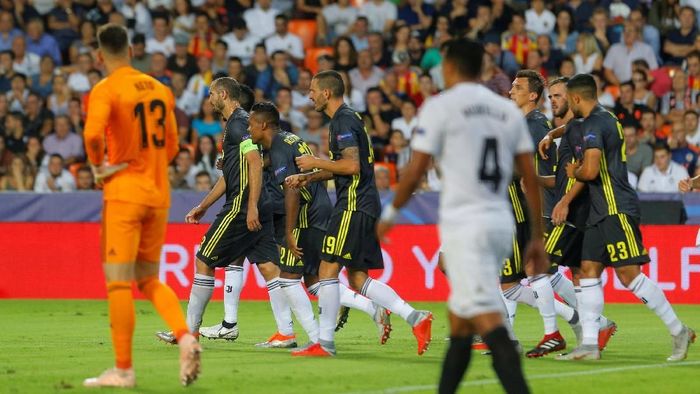 Juventus menang 2-0 di kandang Valencia (Heino Kalis/REUTERS) Juventus menang 2-0 di kandang Valencia (Heino Kalis/REUTERS)