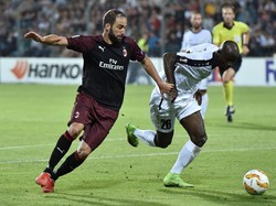 Kemenangan ini, dibarengi hasil 0-0 antara Olympiacos dan Real Betis, membuat Milan bertengger di posisi teratas klasemen Grup F. REUTERS/Eric Vidal.
