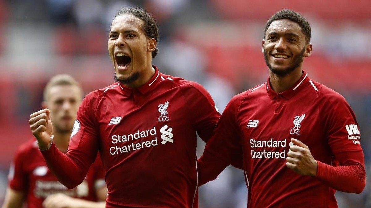 Bek Liverpool Virgil van Dijk dan Joe Gomez absen lama karena cedera lutut parah (Foto: Julian Finney/Getty Images)