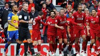 Liverpool memuncaki klasemen sementara dengan 18 poin dari enam laga. Mereka menyapu bersih tujuh laga awalnya musim ini dan merupakan rekor baru klub tersebut. Bisa sejauh apa The Reds? (Phil Noble/Reuters)