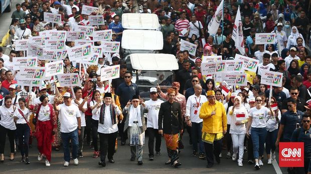 Pasangan Capres-Cawapres mengikuti Pawai Deklarasi Pemilu Damai 2019-2024 di kawasan Monas dan Patung Kuda. Jakarta.Minggu. 23 September 2018.