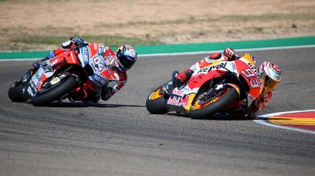 Marc Marquez berhasil memenangi duel lawan Andrea Dovizioso di MotoGP Aragon.