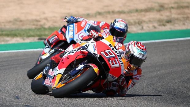 Marc Marquez berhasil mengalahkan Andrea Dovizioso pada balapan MotoGP Aragon 2018.