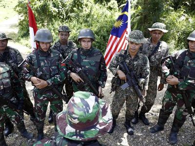Satgas Pamtas Operasi Patok Indonesia Malaysia