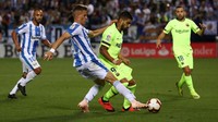 Barcelona coba meningkatkan daya serang dengan memasukkan Luis Suarez dan juga Jordi Alba. Tapi tuan rumah merespons dengan baik dan menutup rapat-rapat pertahanan mereka. (Foto: Sergio Perez/REUTERS)