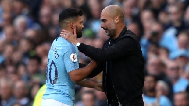 Pep Guardiola bersama Sergio Aguero dalam sebuah pertandingan Liga Inggris musim 2018/2019.