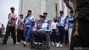 Kemeriahan Pawai Obor Asian Para Games 2018 di CFD