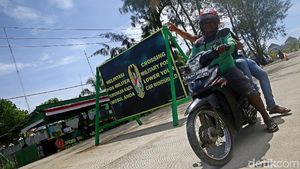 Jalan-jalan Naik Ojek Lintas Batas di PLBN Skouw