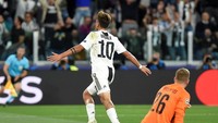 Dybala merayakan gol kedua yang dia buat di menit 33 (REUTERS/Massimo Pinca)