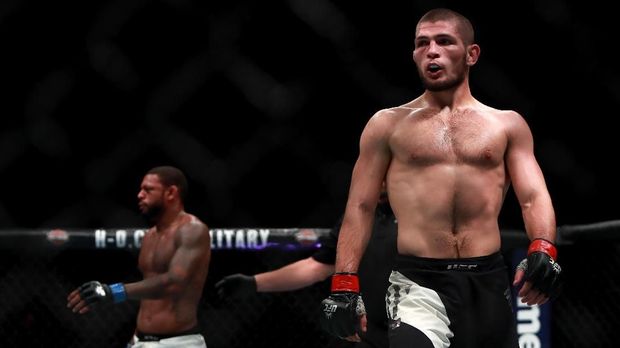 NEW YORK, NY - NOVEMBER 12: Khabib Nurmagomedov of Russia reacts against Michael Johnson of the United States in their lightweight bout during the UFC 205 event at Madison Square Garden on November 12, 2016 in New York City.   Michael Reaves/Getty Images /AFP