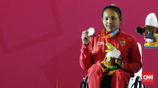 Ni Nengah Widiasih Ni Nengah Widiasih mempersembahkan medali perak untuk Indonesia di Asian Para Games 2018, Balai Sudirman, Jakarta Selatan, Minggu, 7 Oktober 2018. CNN Indonesia/Andry Novelino
