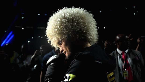 LAS VEGAS, NV - OCTOBER 06: Khabib Nurmagomedov of Russia makes his entrance before competing against Conor McGregor of Ireland in their UFC lightweight championship bout during the UFC 229 event inside T-Mobile Arena on October 6, 2018 in Las Vegas, Nevada. Harry How/Getty Images/AFP