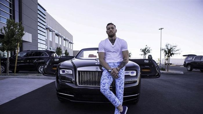 Jadi pendukung Manchester United, Conor McGregor berharap Ole Gunnar Solskjaer segera dapat kontrak permanen (Instagram @thenotoriousmma) Jadi pendukung Manchester United, Conor McGregor berharap Ole Gunnar Solskjaer segera dapat kontrak permanen (Instagram @thenotoriousmma)