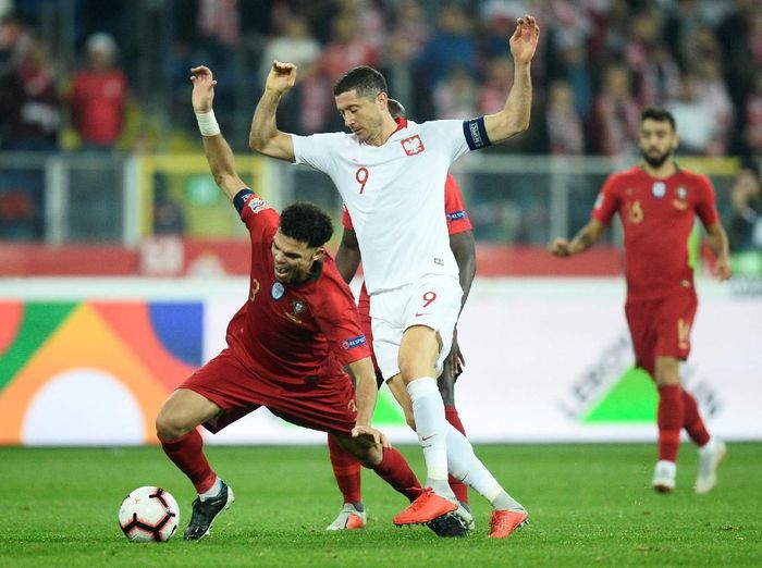 Portugal mengalahkan Polandia 3-2 dalam lanjutan UEFA Nations League. (Foto: Radoslaw Jozwiak/Reuters) Portugal mengalahkan Polandia 3-2 dalam lanjutan UEFA Nations League. (Foto: Radoslaw Jozwiak/Reuters)