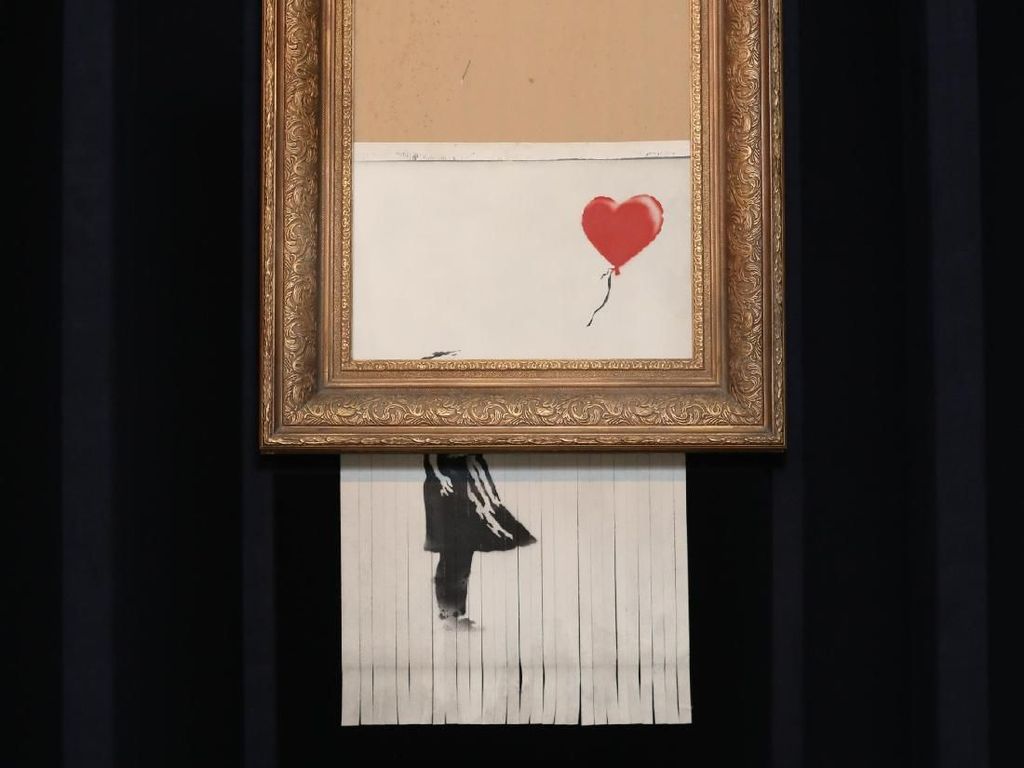 Rekor! Lukisan Robek Banksy Laku Rp 356 M Rekor! Lukisan Robek Banksy Laku Rp 356 M