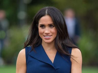 Foto: Gaya Meghan Markle Main Rugby dengan Gaun Rp 13 Jutaan