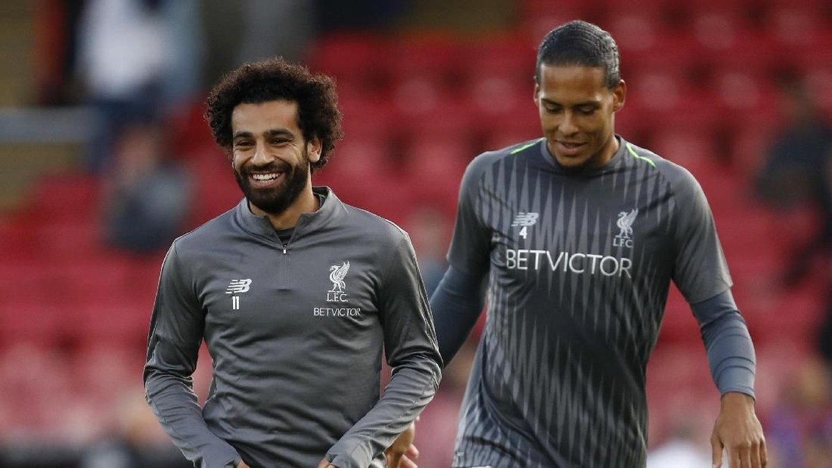Virgil van Dijk dan Mohamed Salah sudah berlatih normal lagi (Getty Images/Julian Finney)