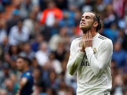 Madrid pun tertahan di peringkat lima dengan 14 poin dari sembilan laga. Reuters/Susana Vera.