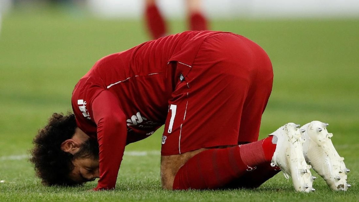Mohamed Salah bikin gol sekaligus mengakhiri puasa di empat laga terakhir (Carl Recine/Reuters)