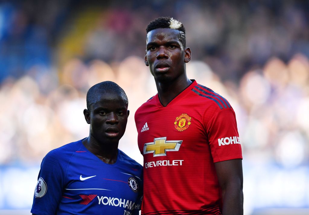 Soccer Football - Premier League - Chelsea v Manchester United - Stamford Bridge, London, Britain - October 20, 2018  Chelsea's N'Golo Kante and Manchester United's Paul Pogba during the match  REUTERS/Dylan Martinez  EDITORIAL USE ONLY. No use with unauthorized audio, video, data, fixture lists, club/league logos or 
