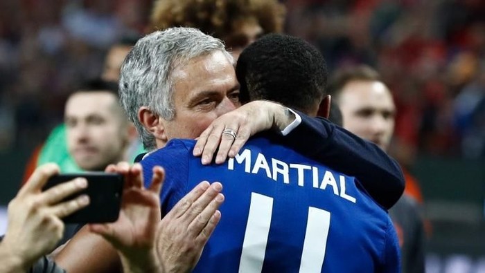 Manchester Uniteds Portuguese manager Jose Mourinho celebrates French striker Anthony Martial after the UEFA Europa League final football match Ajax Amsterdam v Manchester United on May 24, 2017 at the Friends Arena in Solna outside Stockholm. (Photo by Odd ANDERSEN / AFP)