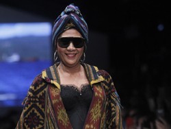 Ini Kata Menteri Susi Soal Baju Motif Ikan yang Dipakainya di OOC 2018