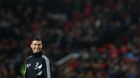 Senyum lebar Cristiano Ronaldo mendapat sambutan meriah dari fans Manchester United (REUTERS/Hannah McKay)