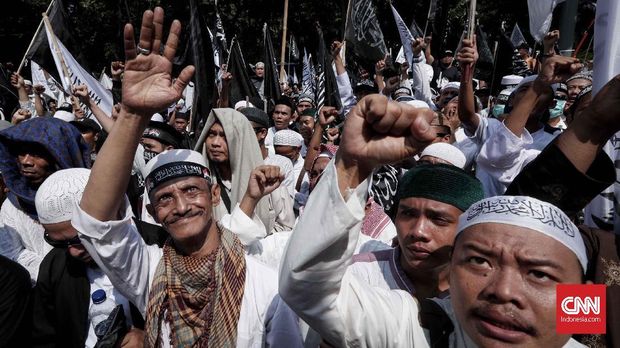 Setengah Hati Jokowi Redam Isu Pembakaran Bendera HTI