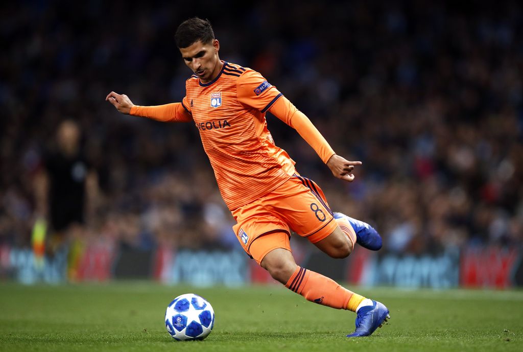 MANCHESTER, ENGLAND - SEPTEMBER 19: Houssem Aouar of Lyon runs with the ball during the Group F match of the UEFA Champions League between Manchester City and Olympique Lyonnais at Etihad Stadium on September 19, 2018 in Manchester, United Kingdom.  (Photo by Julian Finney/Getty Images)