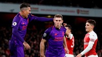 James Milner merayakan gol ke-50 selama kiprahnya di Premier League bersama empat klub yakni Leeds United, Aston Villa, Manchester City, dan Liverpool. (Matthew Childs/Reuters)
