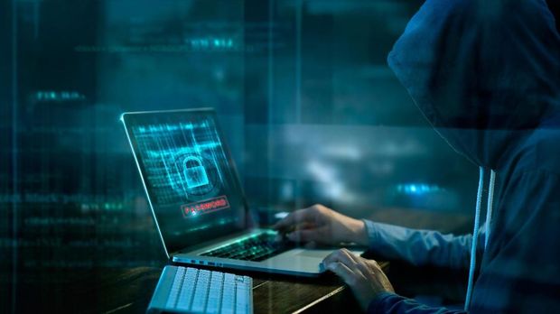 Cyber attack or computer crime hacking password on a dark background.