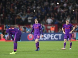 Sementara itu, kekalahan ini membuat perolehan poin Liverpool (6) disamai oleh Napoli. Persaingan di Grup C pun kian ketat karena Paris Saint-Germain punya lima poin. Foto: Marko Djurica/Reuters