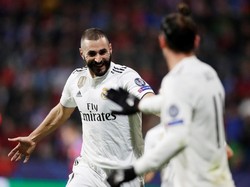 Karim Benzema mencetak gol keduanya melalui aksi individu brilian melewati beberapa pemain sebelum menjebol gawang Viktoria Plzen. (David W Cerny/REUTERS)