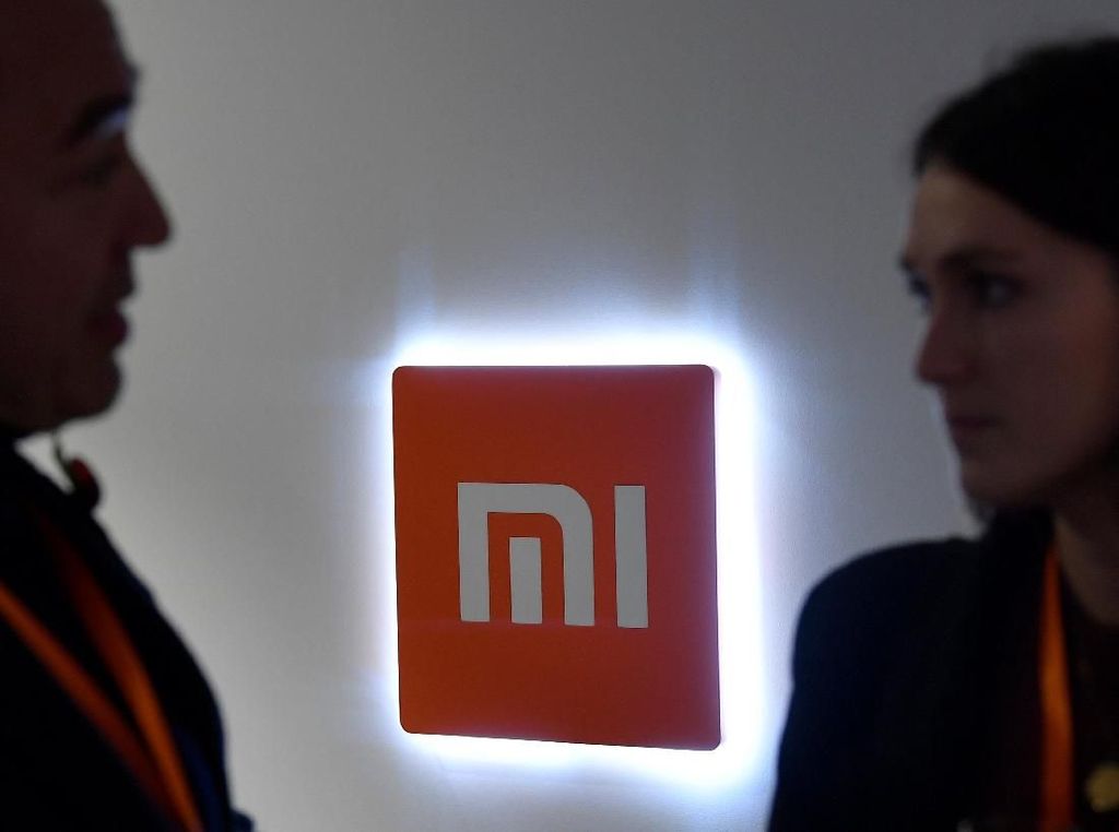 Xiaomi Pamer Desain Ponsel dengan Dua Lubang di Layar Xiaomi Pamer Desain Ponsel dengan Dua Lubang di Layar