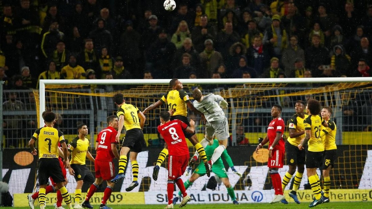 Borussia Dortmund memenangi duel seru melawan Bayern Munich di Bundesliga dengan skor 3-2 (Foto: Wolfgang Rattay/Reuters)