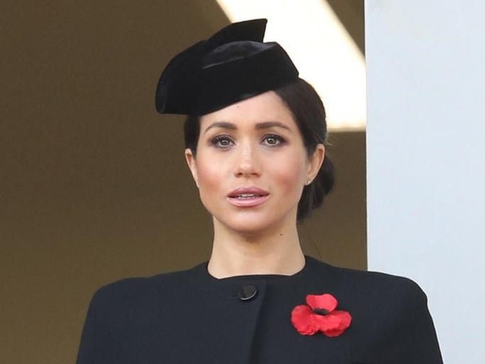 LONDON, ENGLAND - NOVEMBER 11: German FIrst Lady Elke Budenbender and Meghan, Duchess of Sussex look on from a balcony during the annual Remembrance Sunday memorial at the Cenotaph on Whitehall on November 11, 2018 in London, England. The armistice ending the First World War between the Allies and Germany was signed at Compiègne, France on eleventh hour of the eleventh day of the eleventh month - 11am on the 11th November 1918. This day is commemorated as Remembrance Day with special attention being paid for this year’s centenary. (Photo by Jack Taylor/Getty Images)