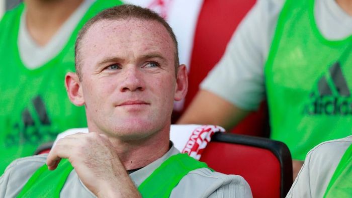 Wayne Rooney sempat diamankan kepolisian bandara di Washington karena mabuk. (Foto: Patrick McDermott/Getty Images) Wayne Rooney sempat diamankan kepolisian bandara di Washington karena mabuk. (Foto: Patrick McDermott/Getty Images)