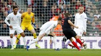 Terus menekan sejak babak babak pertama, Inggris malah tertinggal lebih dulu lewat gol Andrej Kramaric di menit ke-57. (Foto: Carl Recine/Reuters)