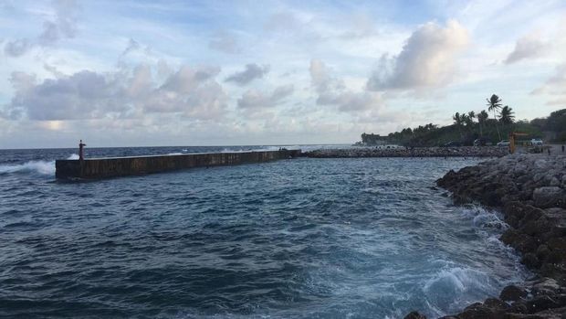 Anibare, Nauru - January 18, 2014: The Republic of Nauru's only boat harbour lies in Anibare District and is a popular site for swimming and the launch of small fishing boats.