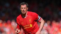 Jamie Carragher menjadi segelintir pesepakbola one-man club. Selama 17 tahun membela Liverpool, Carragher pernah masuk dalam tim terbaik PFA dan dua kali menjadi pemain terbaik Liverpool. Eks bek Inggris itu juga memenangi semua gelar domestik maupun Eropa, kecuali juara Liga Inggris. Foto: Julian Finney/Getty Images