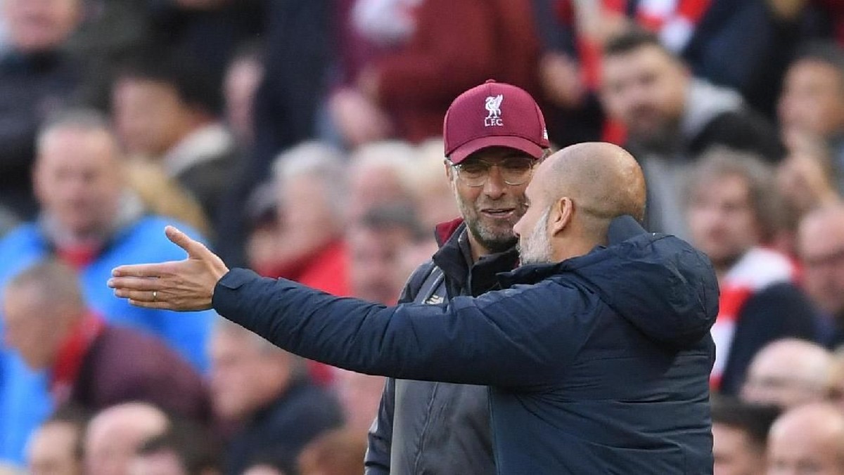 Juergen Klopp menilai Pep Guardiola masih pelatih terbaik dunia (Laurence Griffiths/Getty Images)