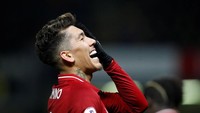 Roberto Firmino bikin satu gol dan satu assist saat Liverpool menang 3-0 atas Watford. Firmino berhasil mengakhiri puasa golnya di Premier League. (Foto: Carl Recine/Reuters)