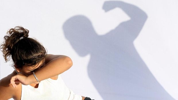 abuse, abusive violent man about to strike frightened woman